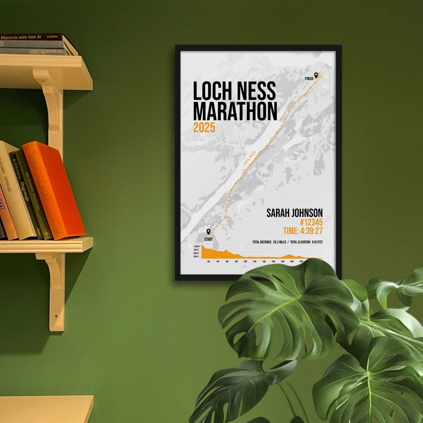 Framed art print on a green wall beside shelves.