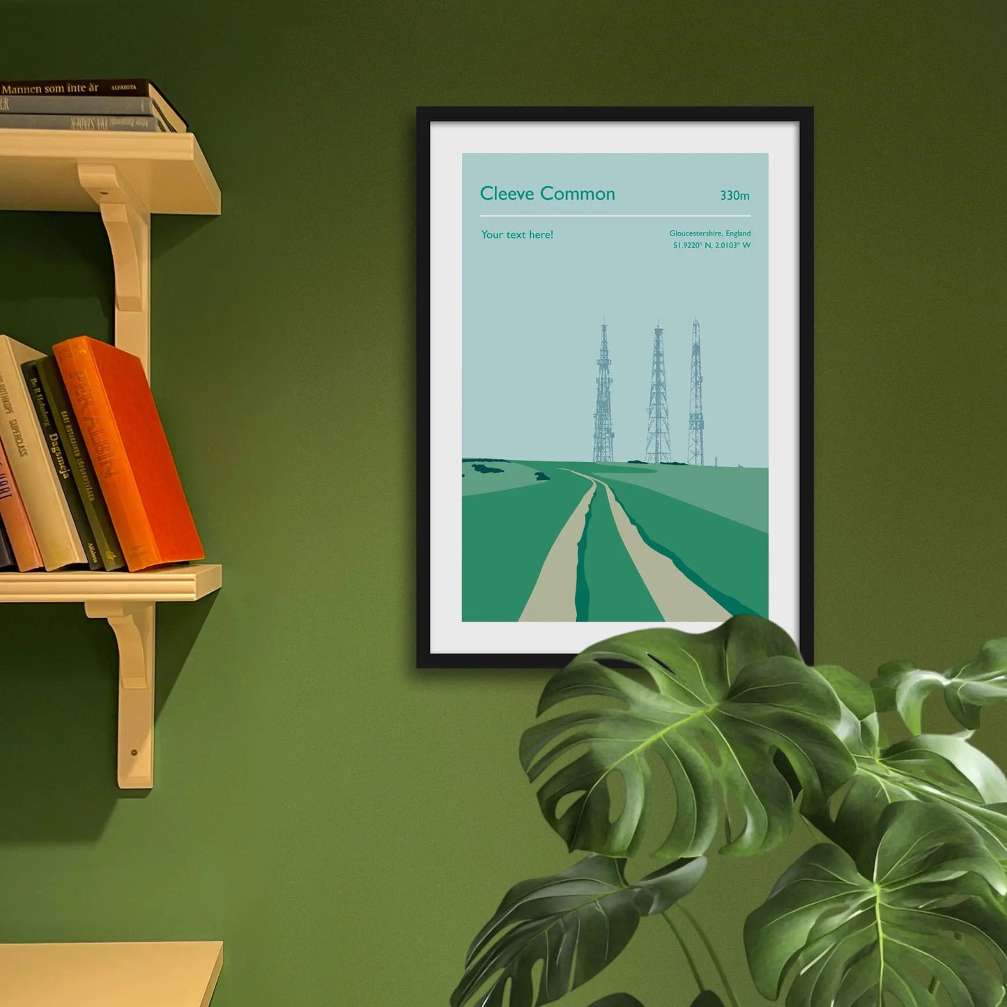 Framed art print on a green wall beside shelves.