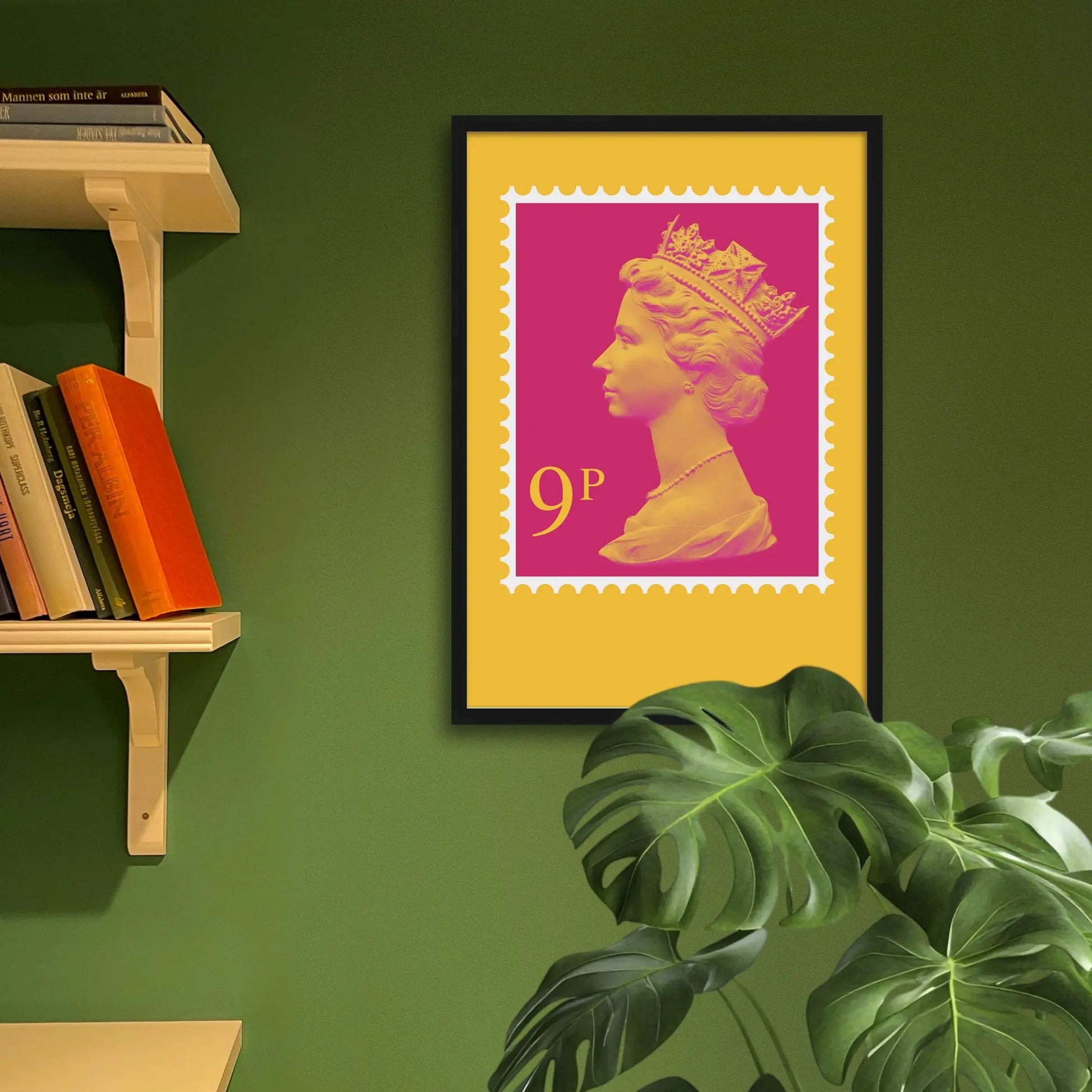 Postage stamp artwork on green wall beside shelves and behind houseplant