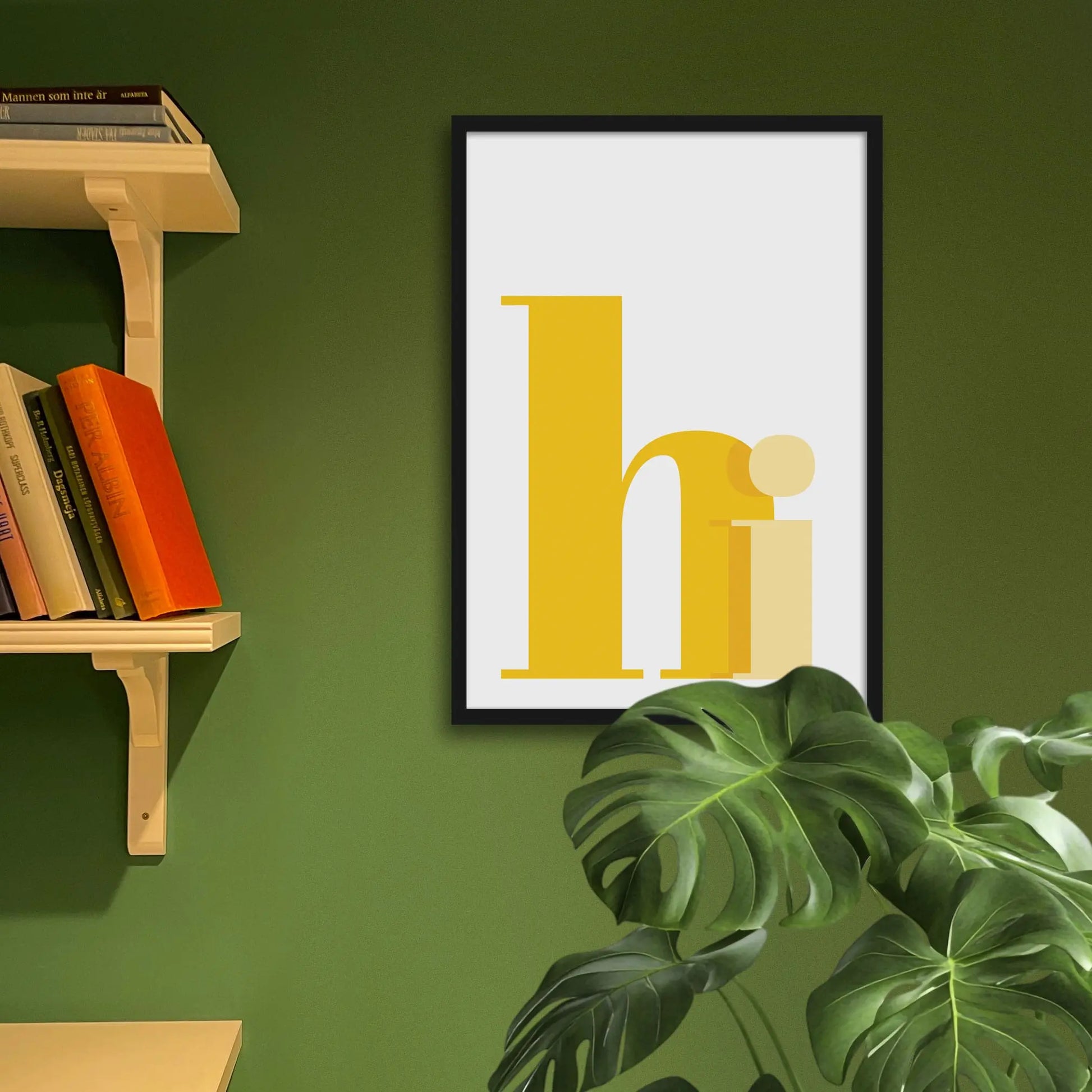 Framed art print on a green wall beside shelves.