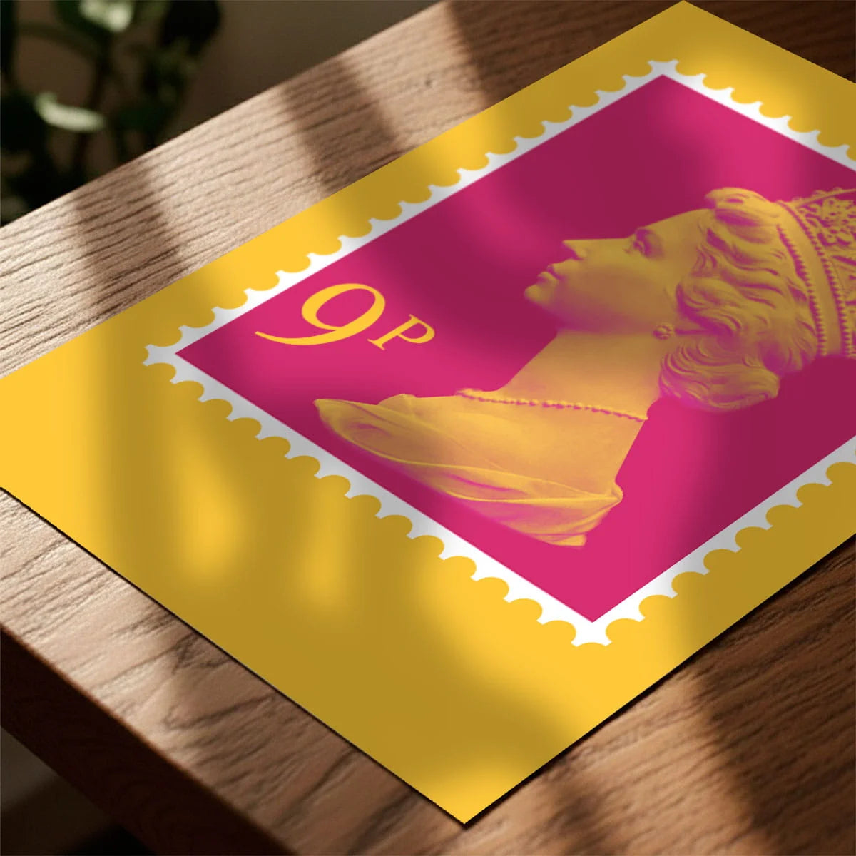 Print laying on table with speckled shade cast across the surface